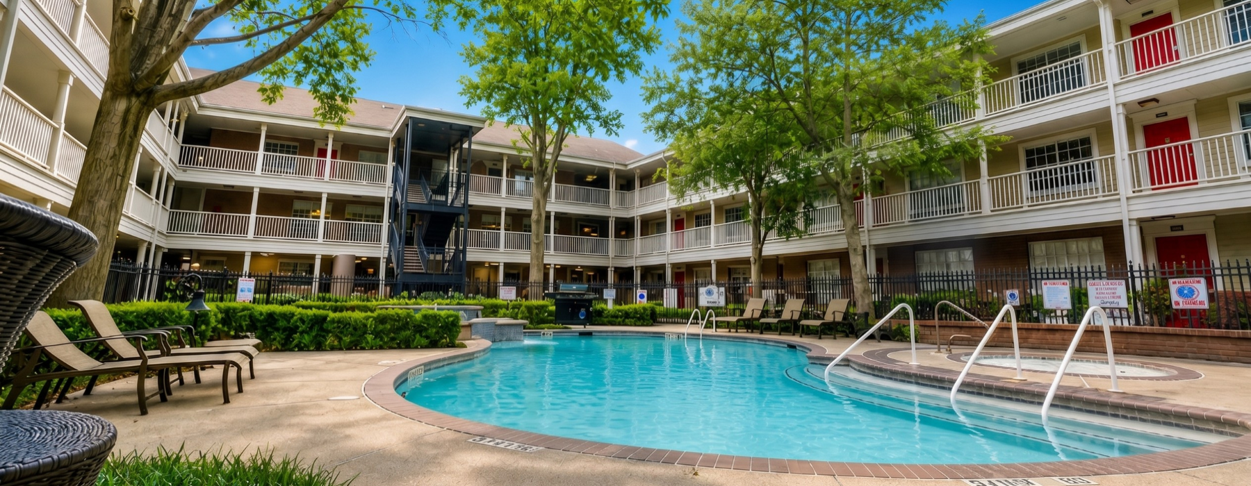 a swimming pool in front of a building