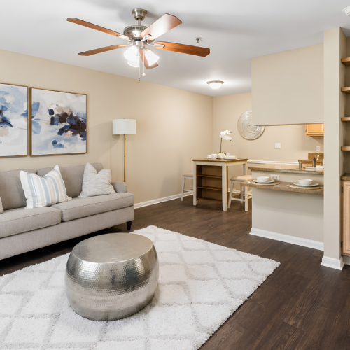 a living room with a couch and a table